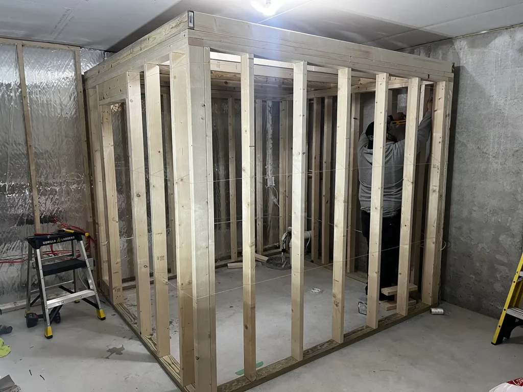 Photo shows a custom built sauna being framed and ready for insulation