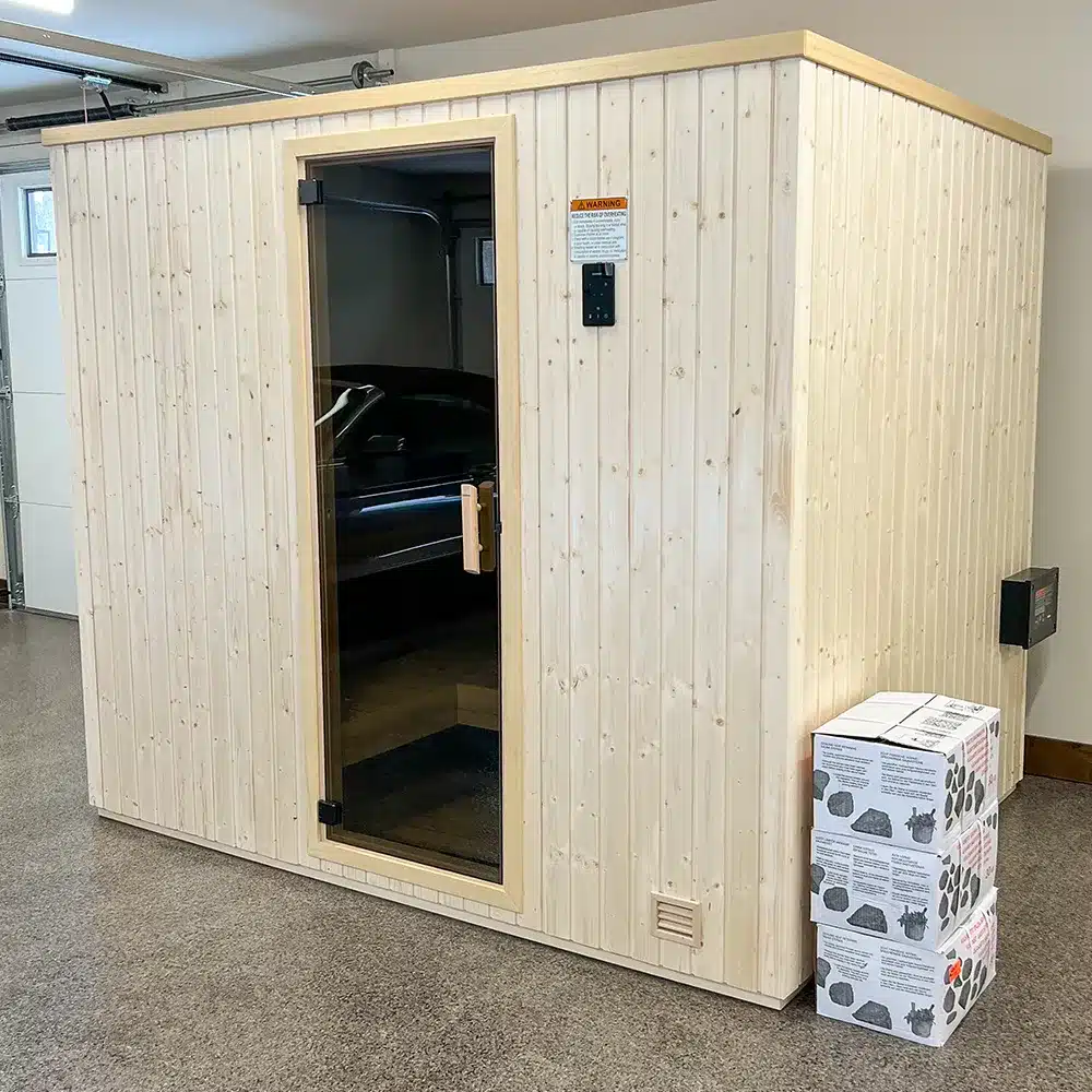 finnleo sisu sauna by sauna supply company - bronze tint door on sauna in garage