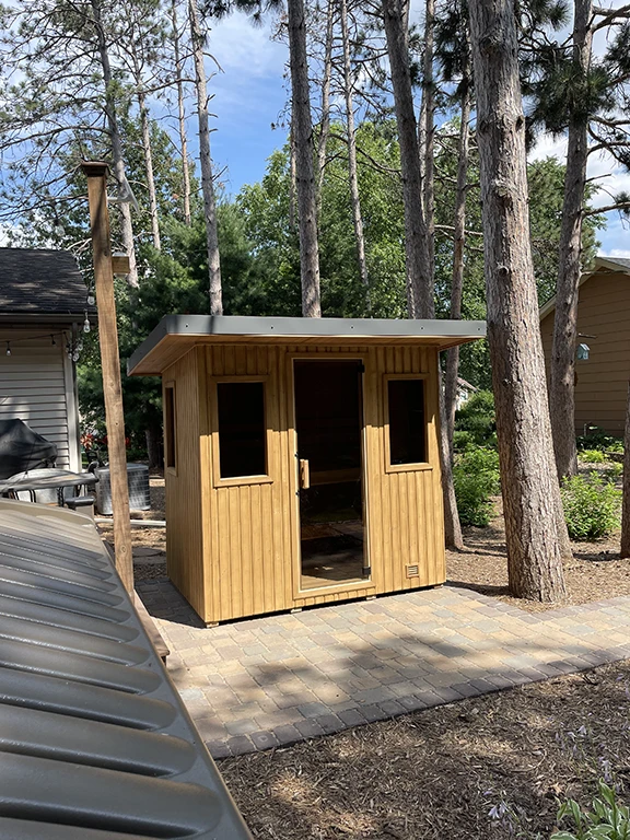 custom euro 5x7 sauna in woods