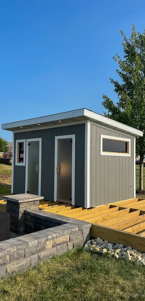 custom outdoor traditional sauna with LP smart siding.