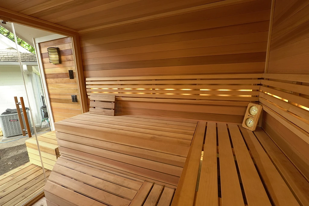 custom cedar sauna with 6 bar curved backrest