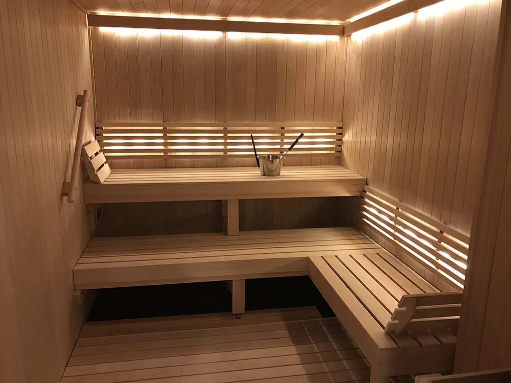 custom cedar sauna with 3 bar backrest