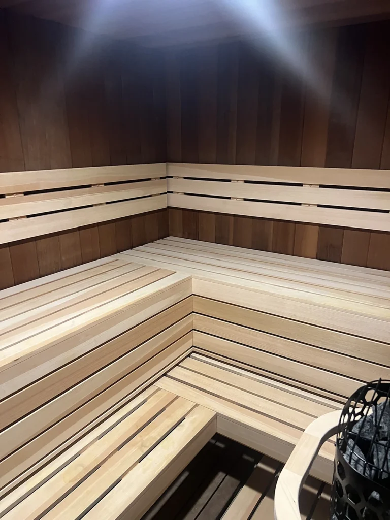 custom cedar sauna remodel with bench skirts