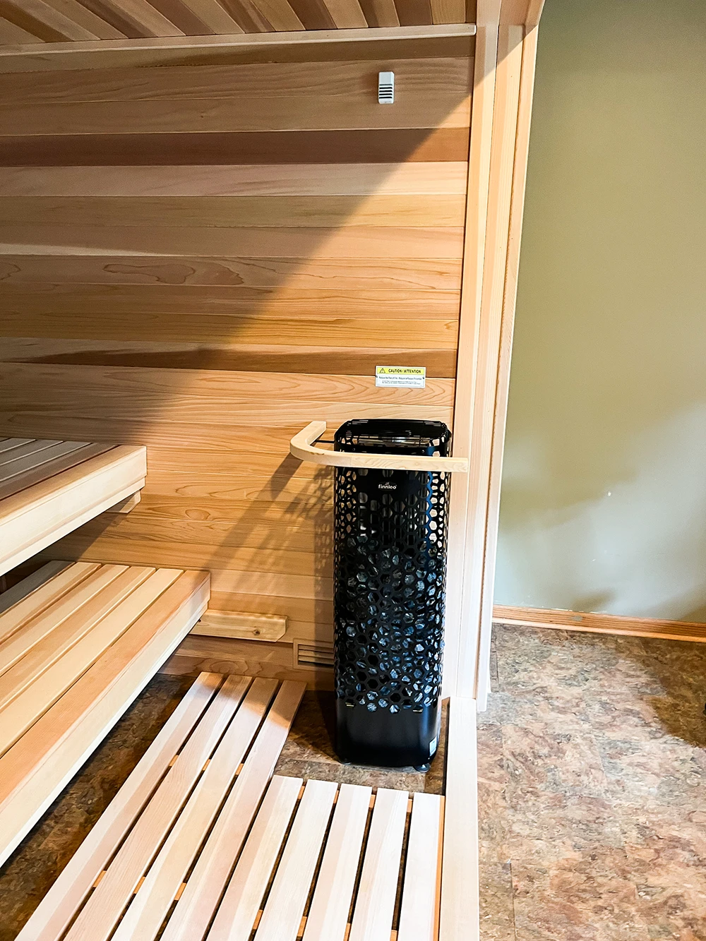 himalaya sauna heater and cedar duckboard