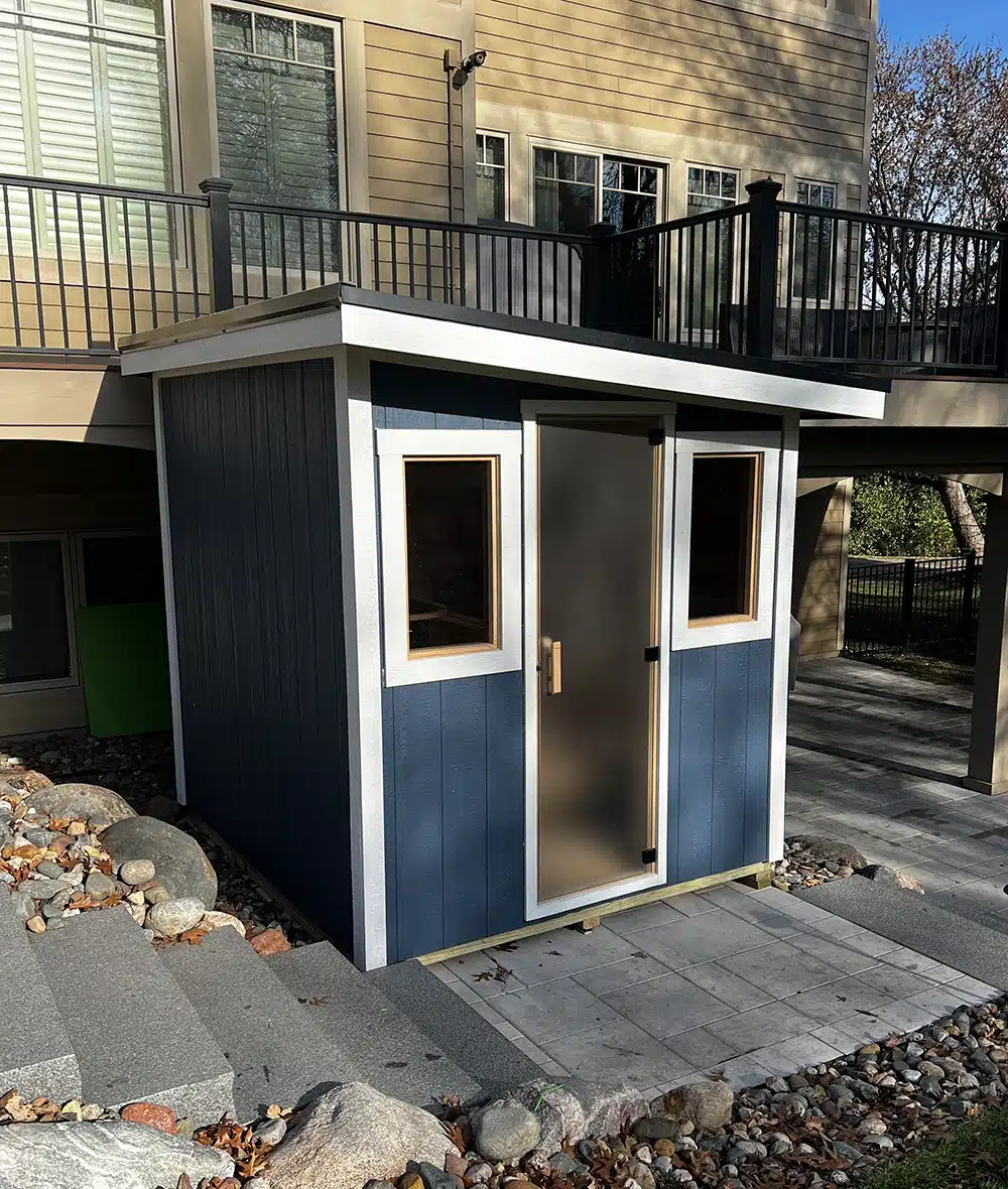 one of our custom outdoor saunas with a blue exterior