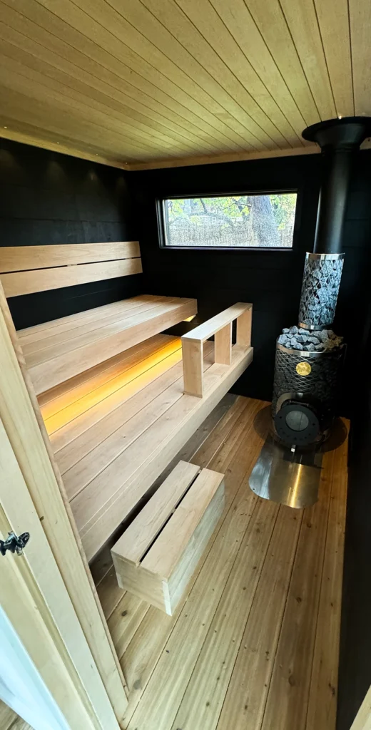 custom black taika and alder wood-fired sauna