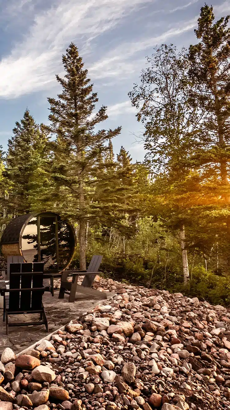 reviva deluxe 600 barrel sauna with sunset in background