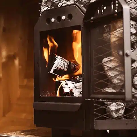 cozy wood-fired heater with flame going