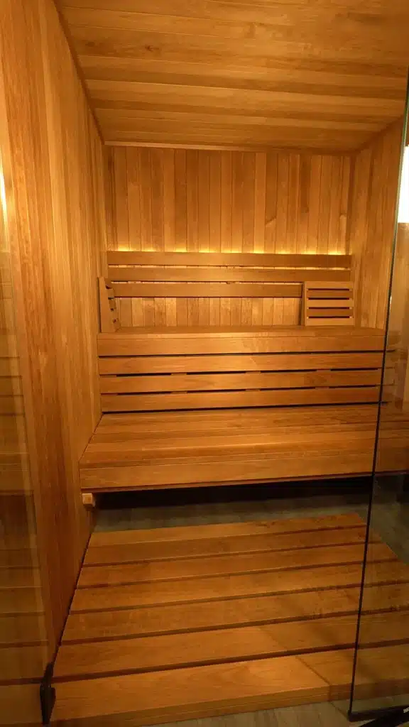 custom thermo-aspen sauna with duckboard walkway