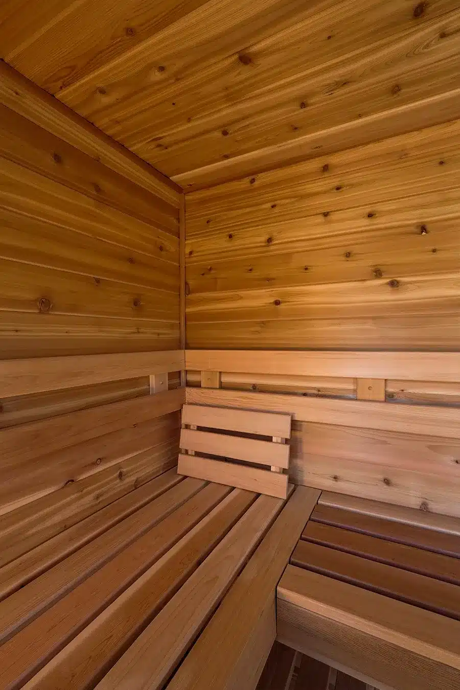 L benching in custom knotty cedar sauna