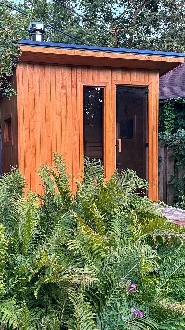 hemlock outdoor sauna behind bushes