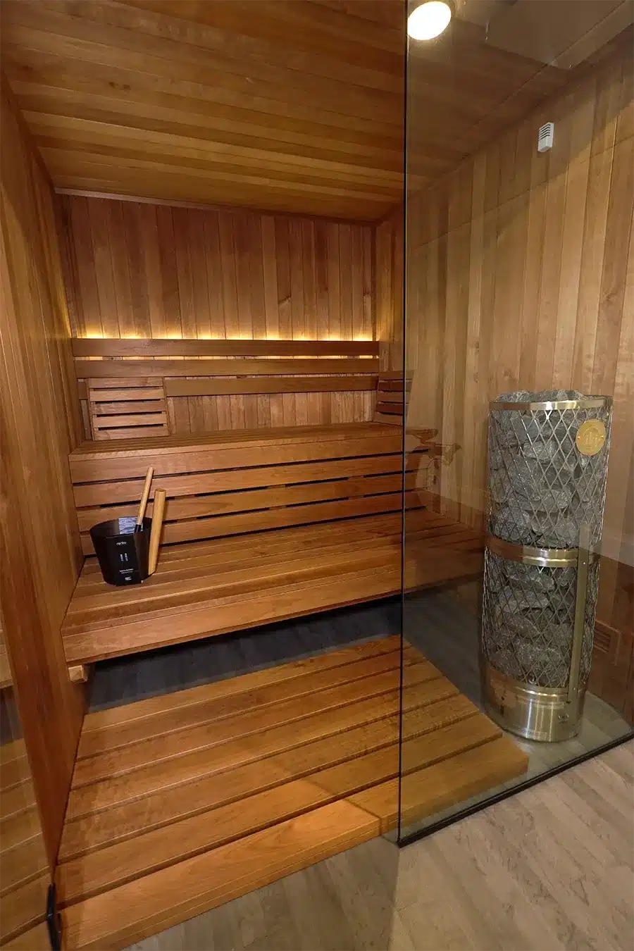outside of thermo-aspen sauna with all glass front