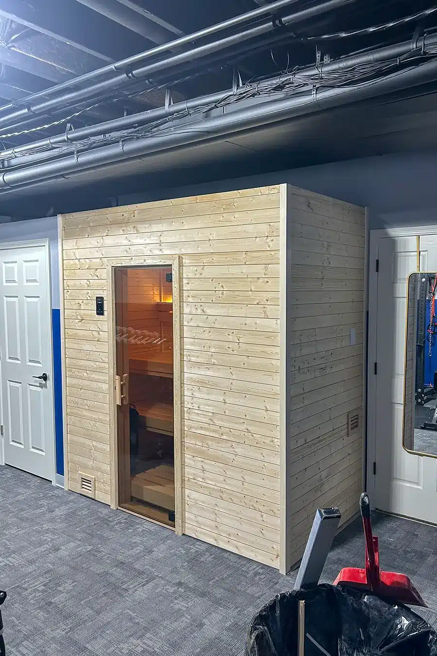 custom nordic spruce sauna in home gym