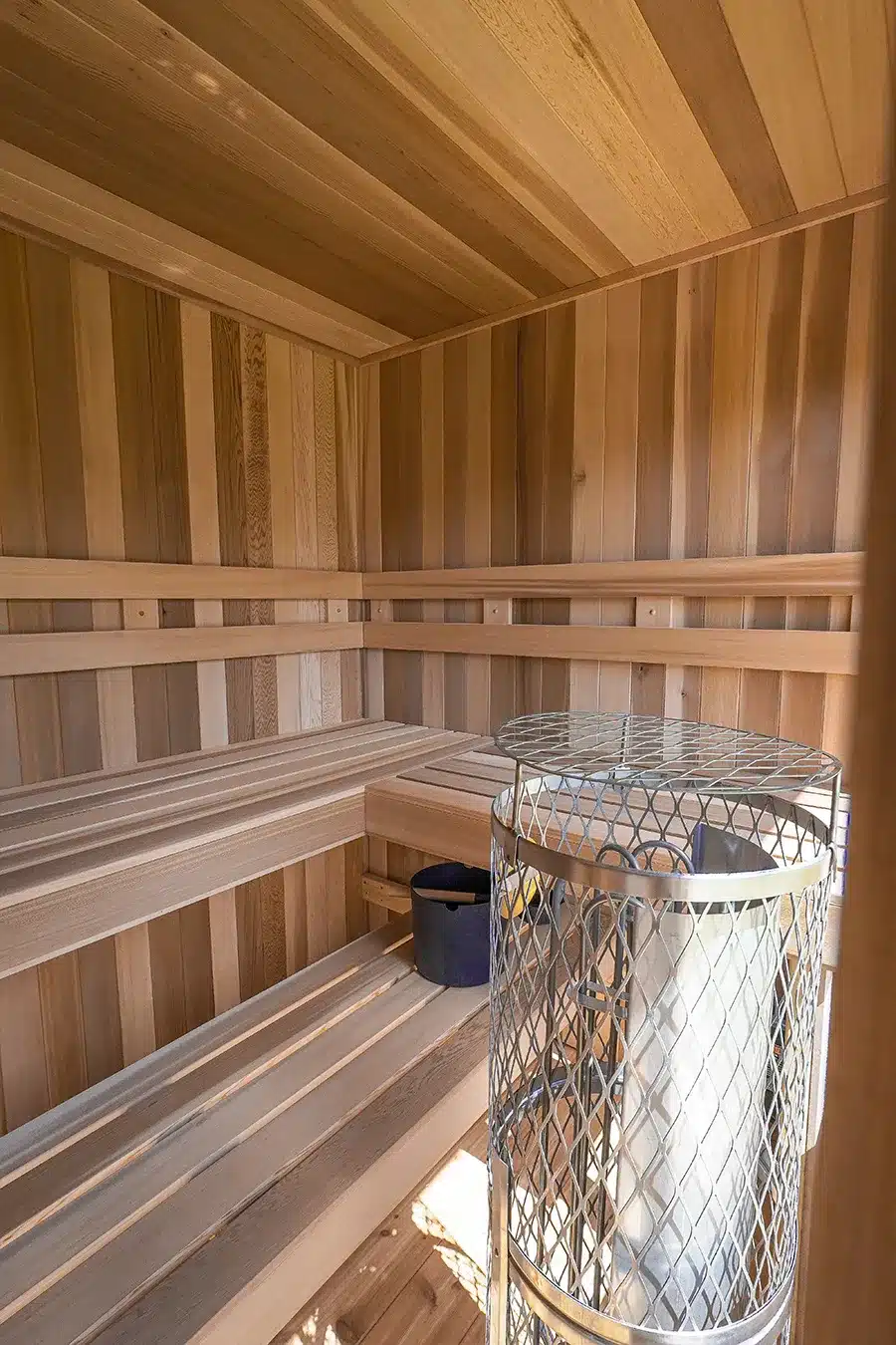 meatsauce's cedar sauna right interior benching and Iki Pillar heater