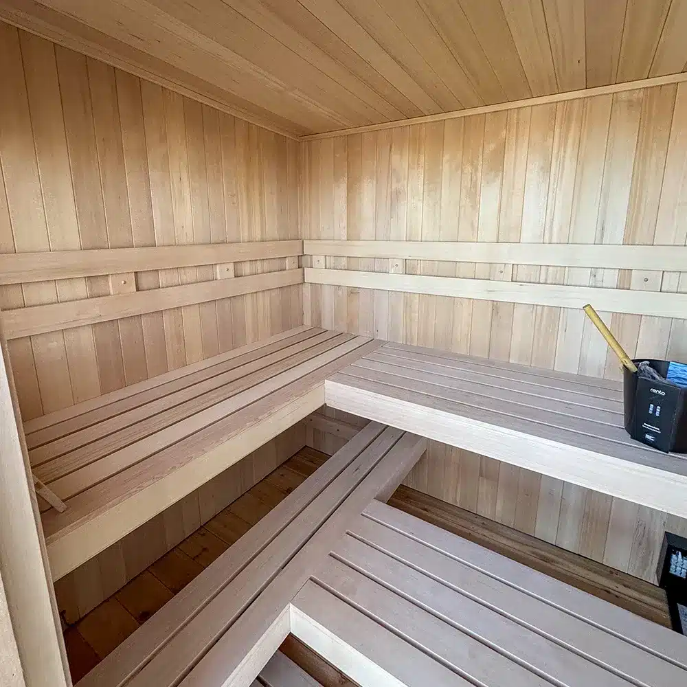custom clear hemlock interior on euro outdoor sauna