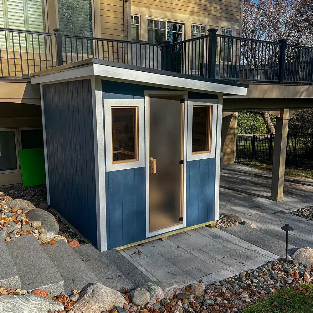 blue custom outdoor sauna 7x8 sauna with left to right sloped roof