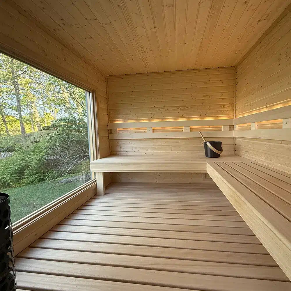 custom outdoor sauna with big glass window and middle platform