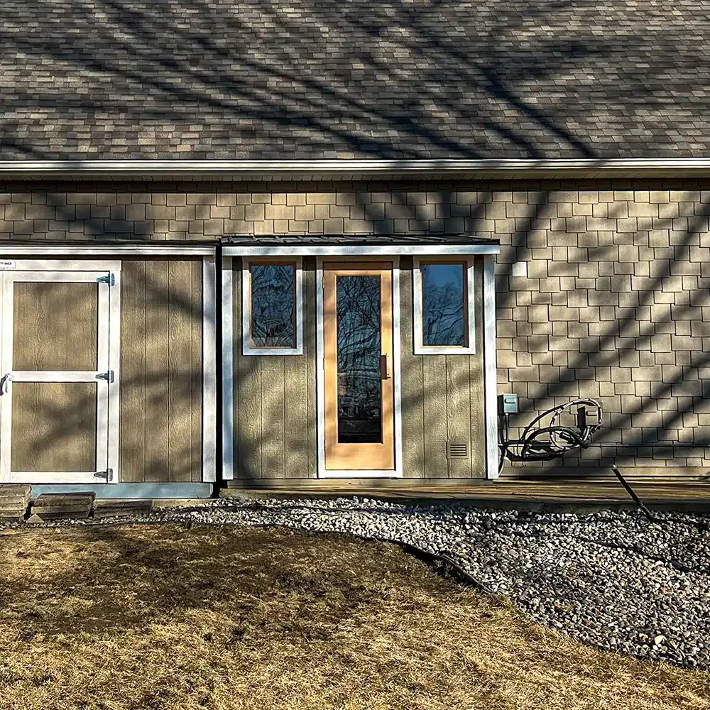 custom sauna built to match the house and shed in minnesota
