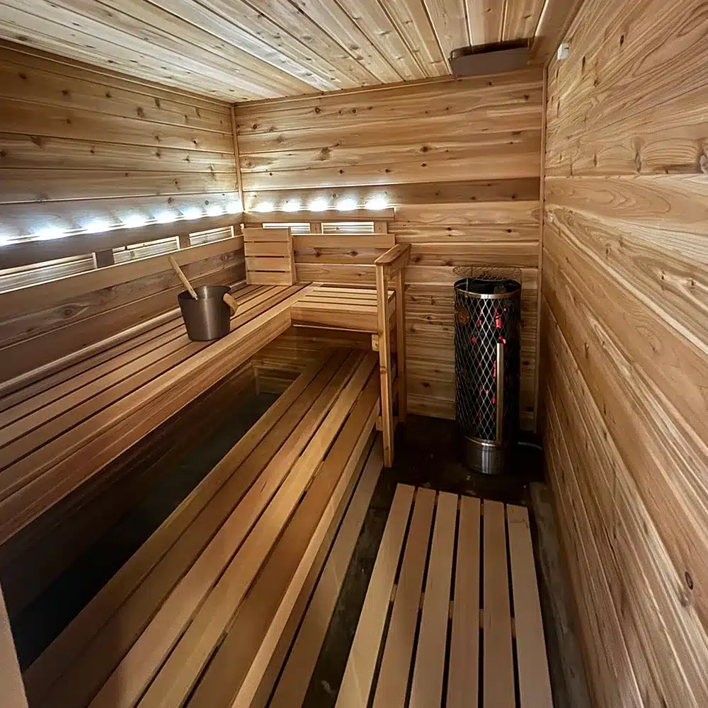 knotty cedar traditional sauna with backrest lighting on