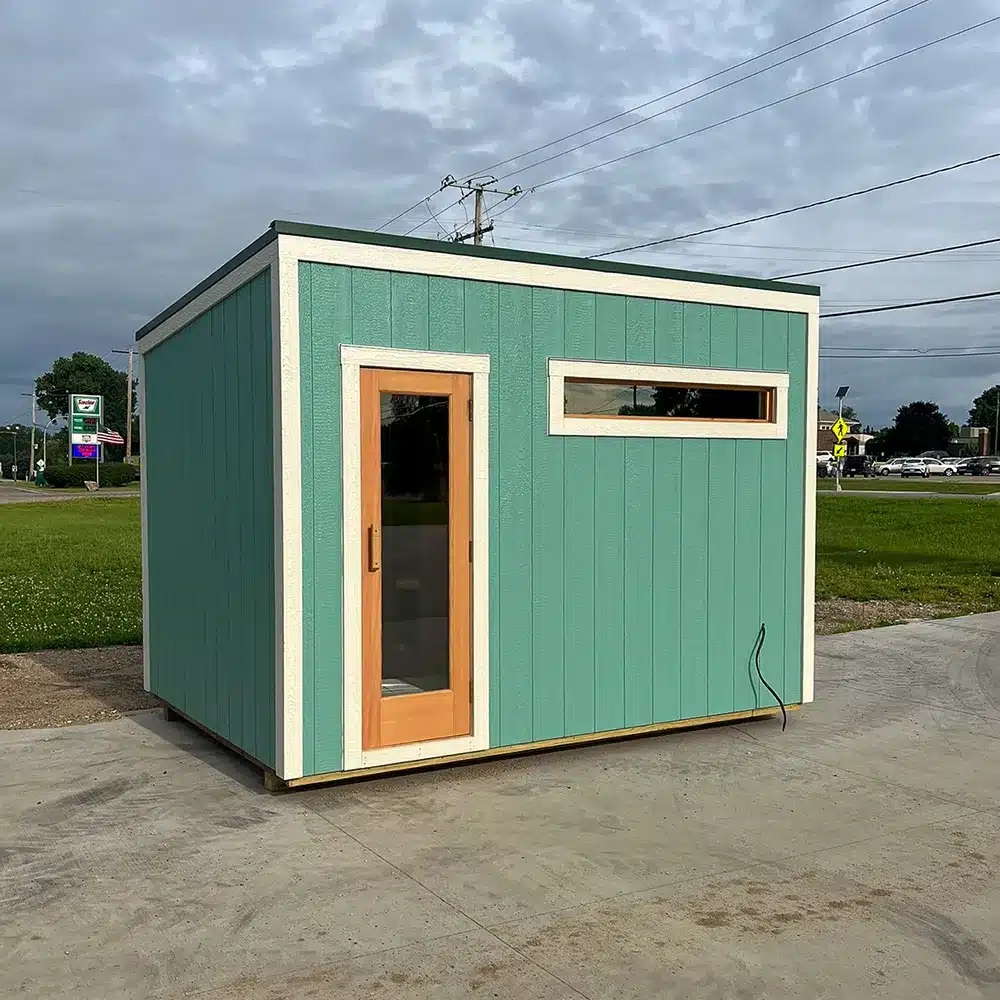 turquoise blue custom outdoor sauna with knotty cedar wood on interior