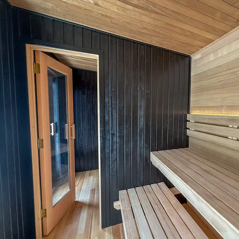 black sauna wax on nordic spruce interior of custom outdoor sauna