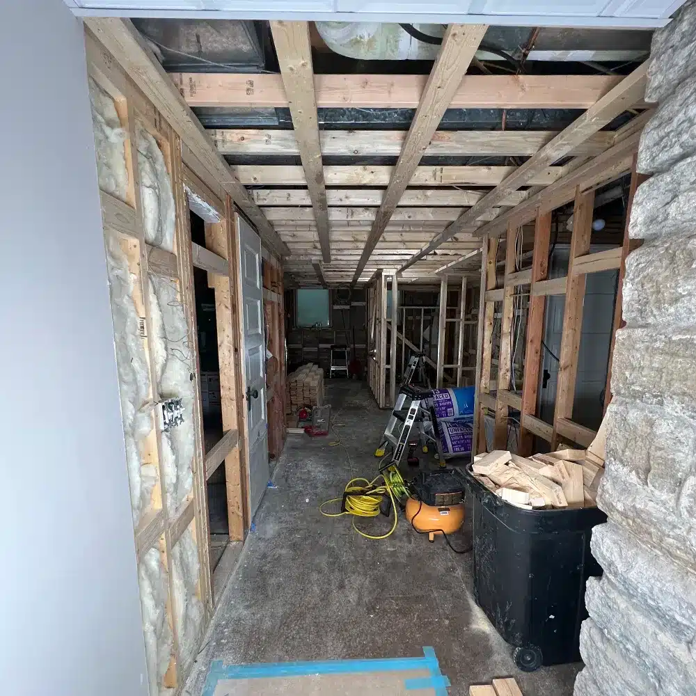 during (framing, insulating) custom built hemlock sauna in minneapolis