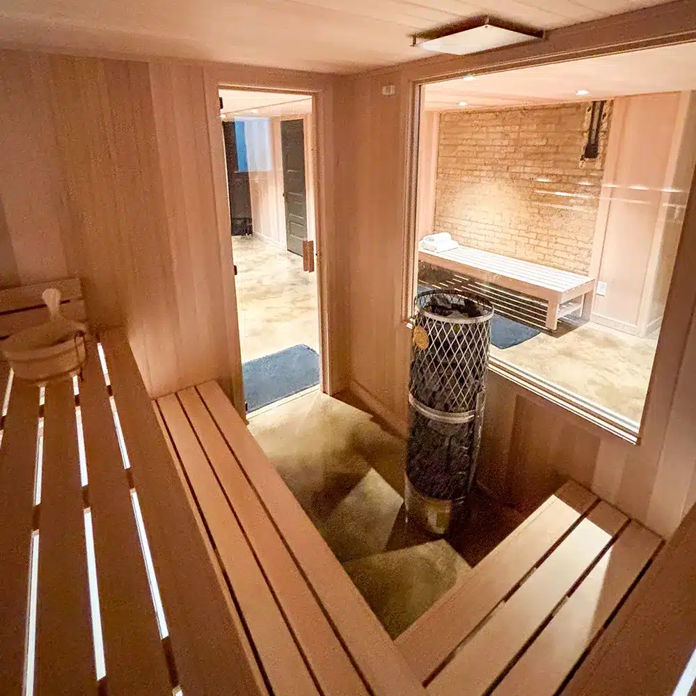 clear canadian hemlock sauna with iki pillar and L bench