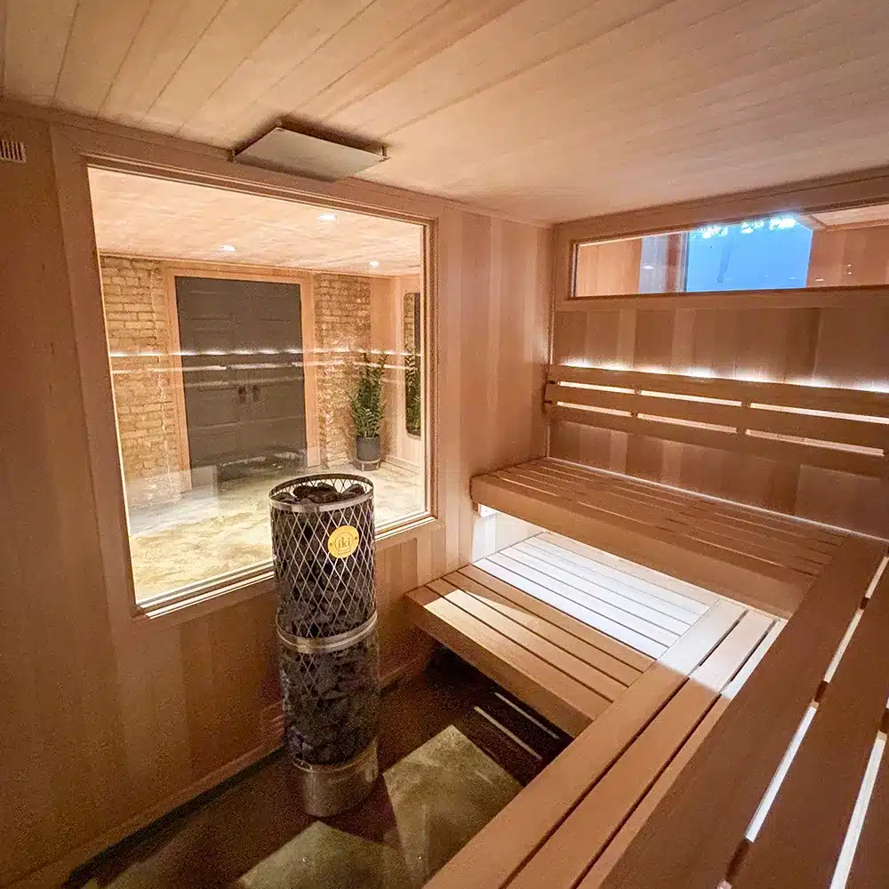 interior of custom clear canadian hemlock sauna and spa in minneapolis