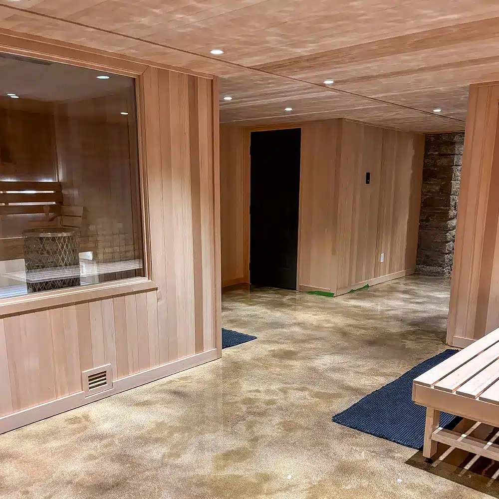 right angle of custom built clear canadian hemlock sauna in basement