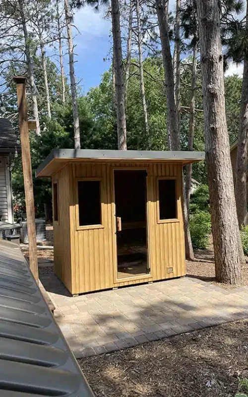 custom euro 5x7 sauna in woods